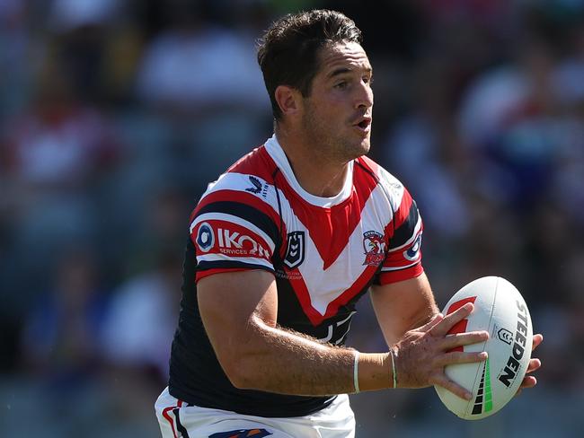 GOSFORD, AUSTRALIA - FEBRUARY 23: Nat Butcher of the Roosters runs with the ball during the 2025 NRL Pre-Season Challenge match between Sydney Roosters and Newcastle Knights at Industree Group Stadium on February 23, 2025 in Gosford, Australia. (Photo by Mark Metcalfe/Getty Images)