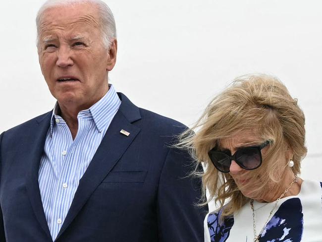 TOPSHOT - US President Joe Biden and First Lady Jill Biden step off Air Force One upon arrival at Francis S. Gabreski Airport in Westhampton Beach, New York on June 29, 2024. Biden is heading to East Hampton, New York, to attend campaign fundraisers. (Photo by Mandel NGAN / AFP)