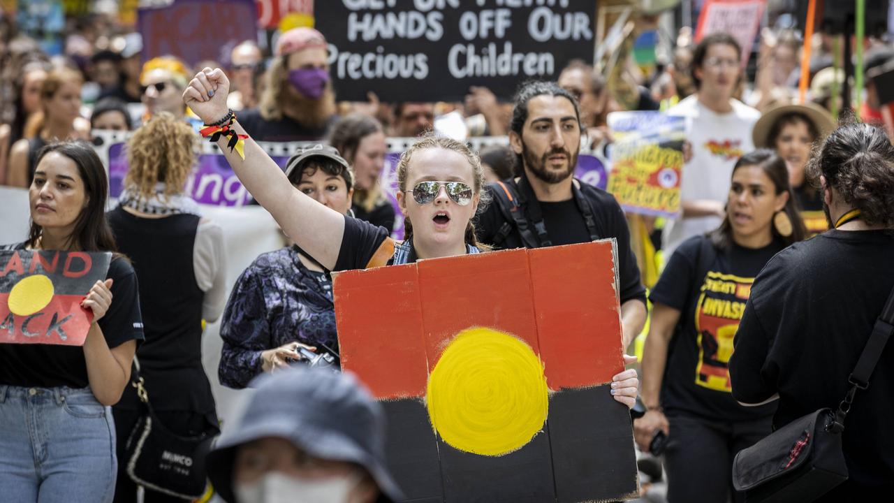 Police descend on CBD as protesters gather for Invasion Day rally