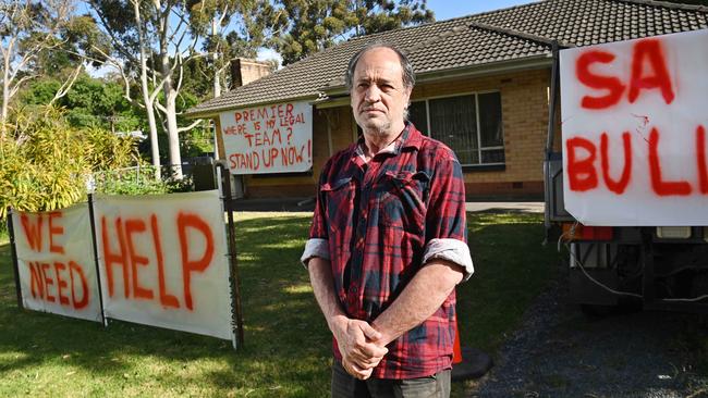 George Bryant, 60, and his mother Mary Bryant, 90, are fighting SA Water over a big sewerage storage tank that its building next door, which they say is destroying their home. Picture: Keryn Stevens