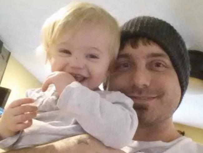 Cavender with his daughter.