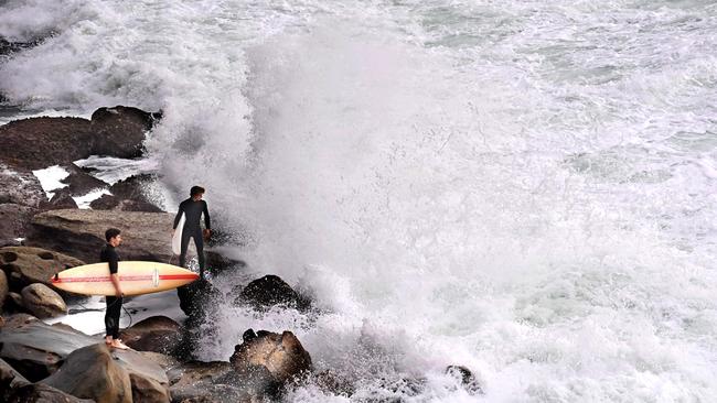 Surfers faced the dangerous swell at Deadman’s despite BOM warnings. Picture: NCA NewsWire / Jeremy Piper