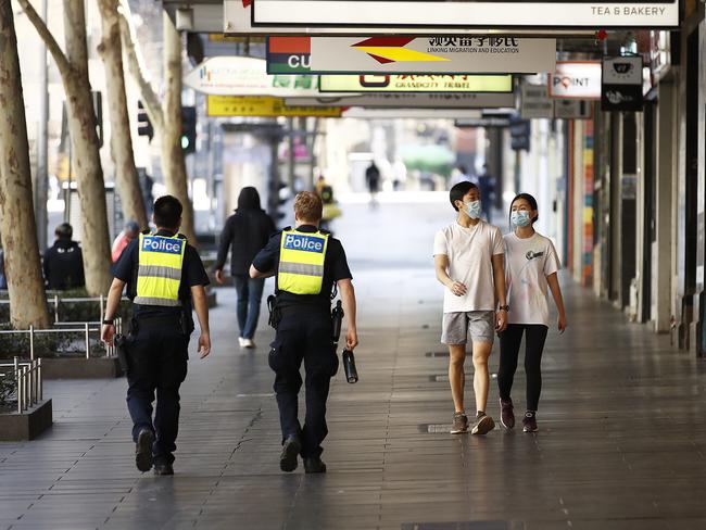 Police patrol Elizabeth St, Melbourne. Picture: Getty Images