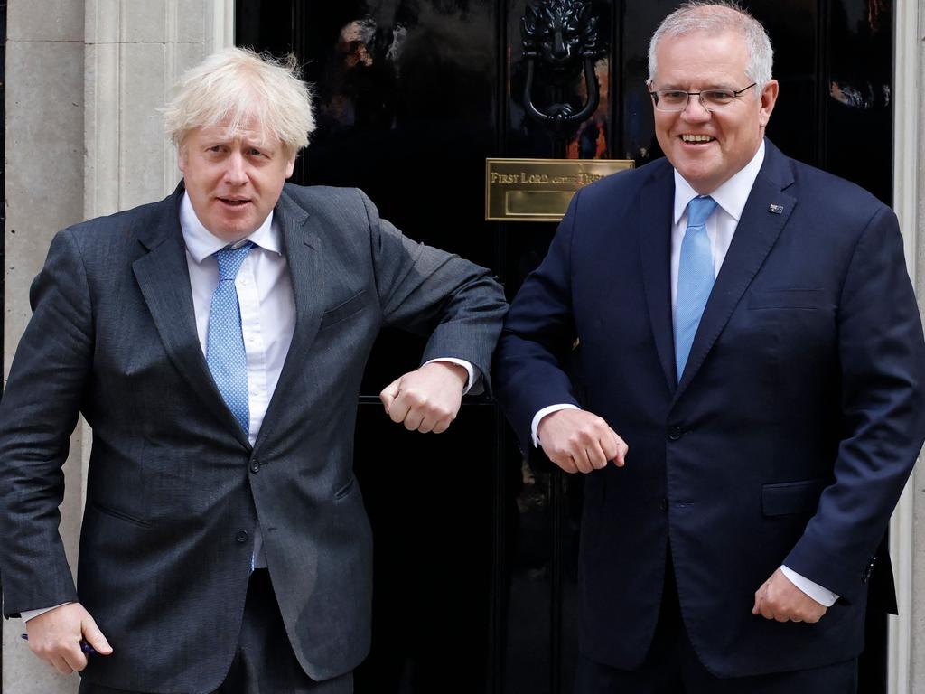 Britain's Prime Minister Boris Johnson greets Australian Prime Minister Scott Morrison outside 10 Downing street in central London. Picture: Tolga Akmen/AFP