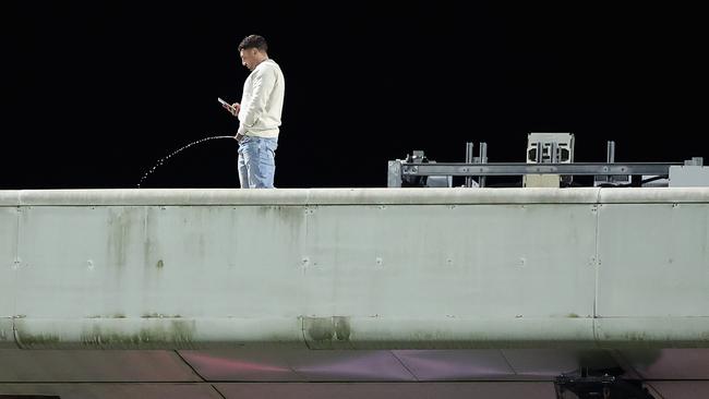 The spectator on the roof. Photo by Cameron Spencer/Getty Images.