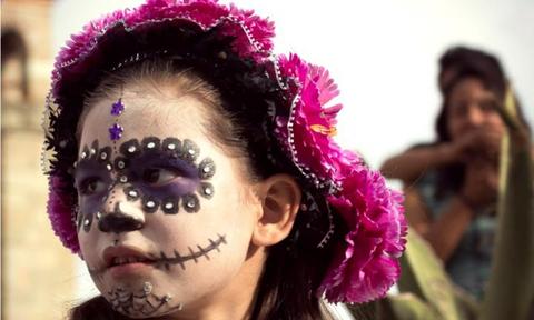 In Mexico, Halloween is celebrated as 'Día de los Muertos,' or Day of the Dead. This day is also celebrated by much of the Hispanic world as a time to pray for and remember family and friends who have died. They also dress as ghouls, taking to the streets to parade and celebrate.