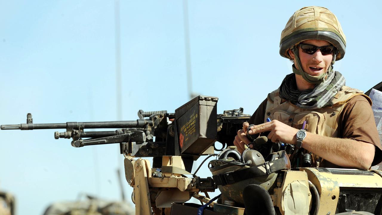 Prince Harry atop a military vehicle in the Helmand province, Southern Afghanistan in 2008.
