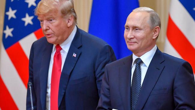 Mr Trump and Mr Putin during their press conference. Pic: AFP