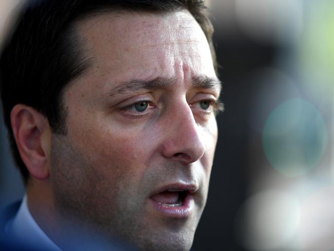 Victorian state opposition leader Matthew Guy holds a media doorstop outside Parliament House in Melbourne, Wednesday, October 18, 2017. Mr Guy was giving his reaction to the Victorian Government's plan to ban plastic shopping bags. (AAP Image/Joe Castro) NO ARCHIVING