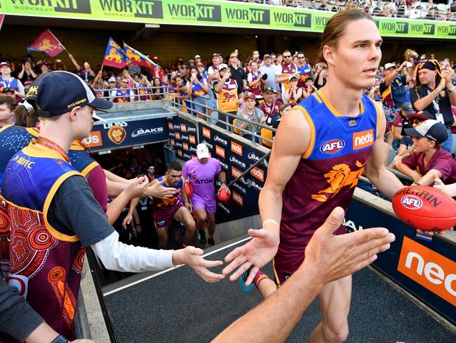 Eric Hipwood of the Lions is seen running onto the field before the Round 22 AFL match between the Brisbane Lions and the Geelong Cats at the Gabba in Brisbane, Saturday, August 17, 2019.  (AAP Image/Darren England) NO ARCHIVING, EDITORIAL USE ONLY