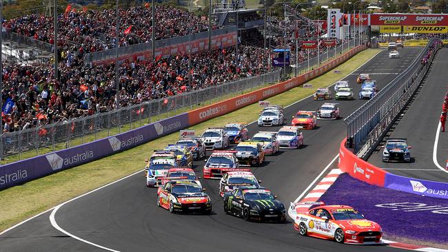 Scott McLaughlin leads the field off the start at the first turn of last year's Bathurst 1000.