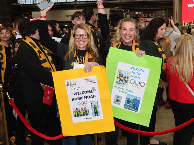 Hundreds of fans gathered at Sydney Airport to welcome home our athletes. Picture: Rohan Kelly