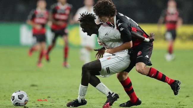Newcastle’s Kuach Yuel Is challenged by Western Sydney’s Mark Natta at Bankwest Stadium. Picture: Getty Images