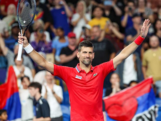 Serbiaâs Novak Djokovic celebrates after winning against Chinaâs Zhang Zhizhen during their men's singles match at the United Cup tennis tournament in Perth on December 31, 2023. (Photo by COLIN MURTY / AFP) / -- IMAGE RESTRICTED TO EDITORIAL USE - STRICTLY NO COMMERCIAL USE --