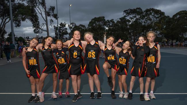 St Joseph’s Black under-11 netball team pull their funniest faces.