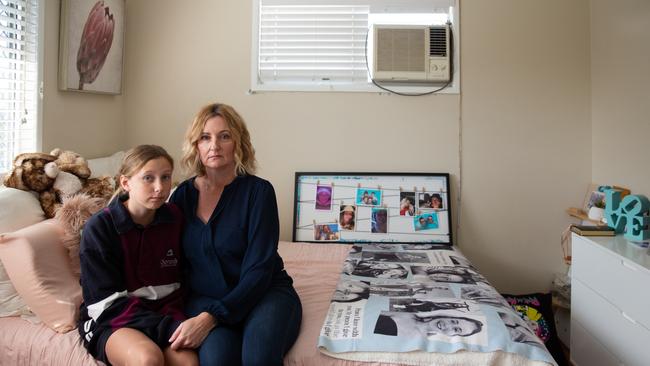 Kellie Postle with her daughter, Ella, in Alyssa’s bedroom. Picture: David Kelly.