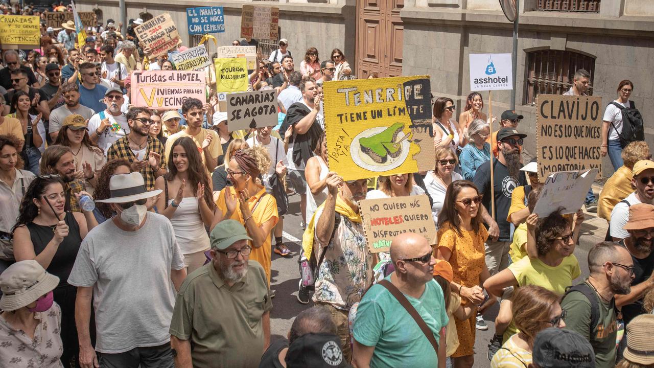 Tens of thousands of demonstrators hit the streets across Spain's Canary Islands on April 20 to demand changes to the model of mass tourism they say is overwhelming the Atlantic archipelago. Picture: Desiree Martin / AFP