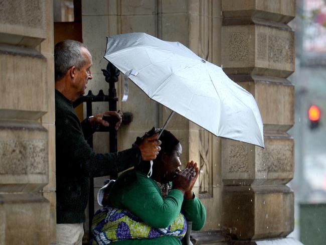 Wet weather in Victoria Square, Adelaide. Picture: Greg Higgs