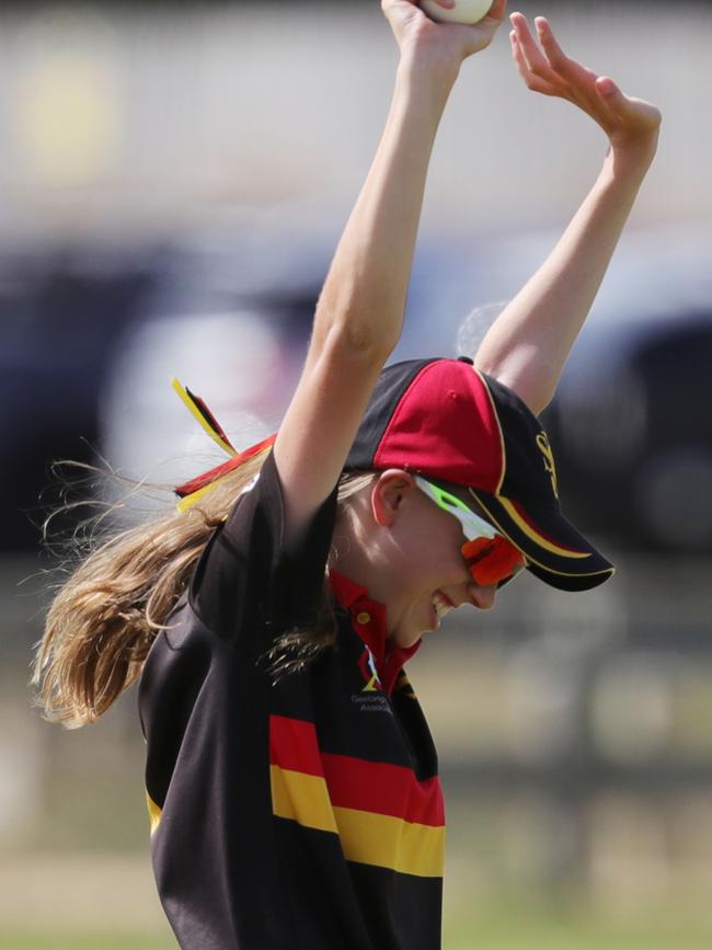 St Joseph's Anna Withers celebrates her catch of Murgheboluc batter Carolyn Friend. Picture: Mark Wilson