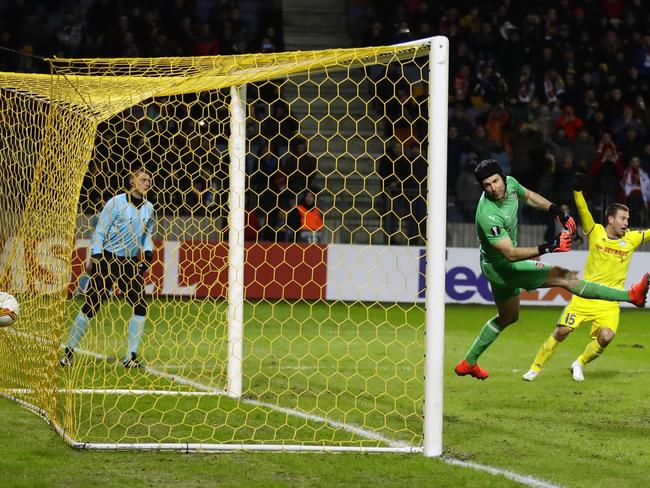 Bate's Maksim Skavysh, right, celebrates after Bate's Stanislav Dragun scoring his side's opening goal during the Europa League round of 32 first leg soccer match between Bate and Arsenal at the Borisov-Arena in Borisov, Belarus, Thursday, Feb. 14, 2019. (AP Photo/Sergei Grits)