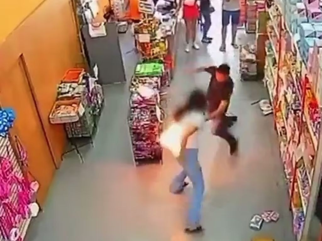 The phone exploded in her back pocket while she was shopping at a supermarket in Brazil. Picture: CCTV