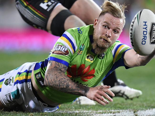 Blake Austin of the Raiders off loads the ball during the round 15 NRL match between the Penrith Panthers and the Canberra Raiders at Carrington Park in Bathurst, Saturday, June 10, 2017.  (AAP Image/Dean Lewins) NO ARCHIVING, EDITORIAL USE ONLY