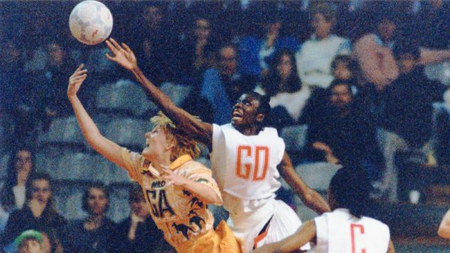 Netball - Australia v Trinidad and Tobago Milo Cup match at the Powerhouse 13 Jul 1994. Trinidad and Tobago goal defence Simone Bowen battles to deny Australian goal attack Nicole Cusack this pass into the circle.