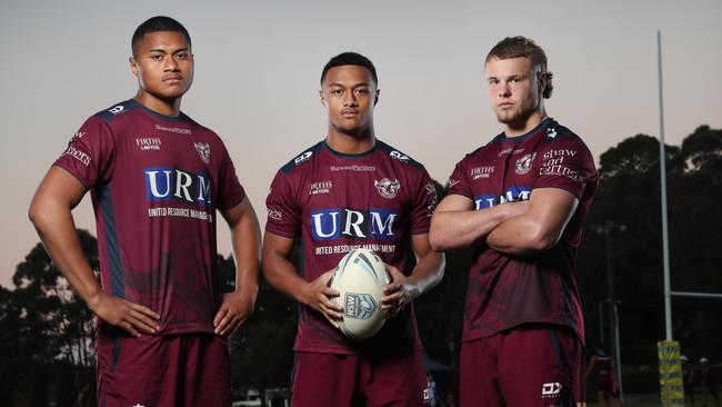 Latu Fainiu (centre) with his Sea Eagles teammates Picture: Richard Dobson