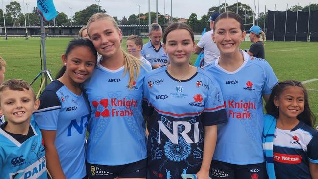 Waratahs players with young rugby fans. Picture: Supplied