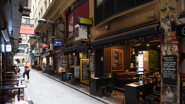 Cafes lie empty in the city. Picture: Josie Hayden