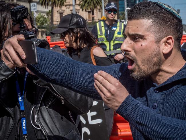 Right wing activist and former Israeli IDF soldier Avi Yemini on his campaign to change legislation that would allow the deportation of violent immigrants and the legatisation of non-lethel weapons for public protection. Avi speaks at a rally in Melbourne. Picture: Jake Nowakowski