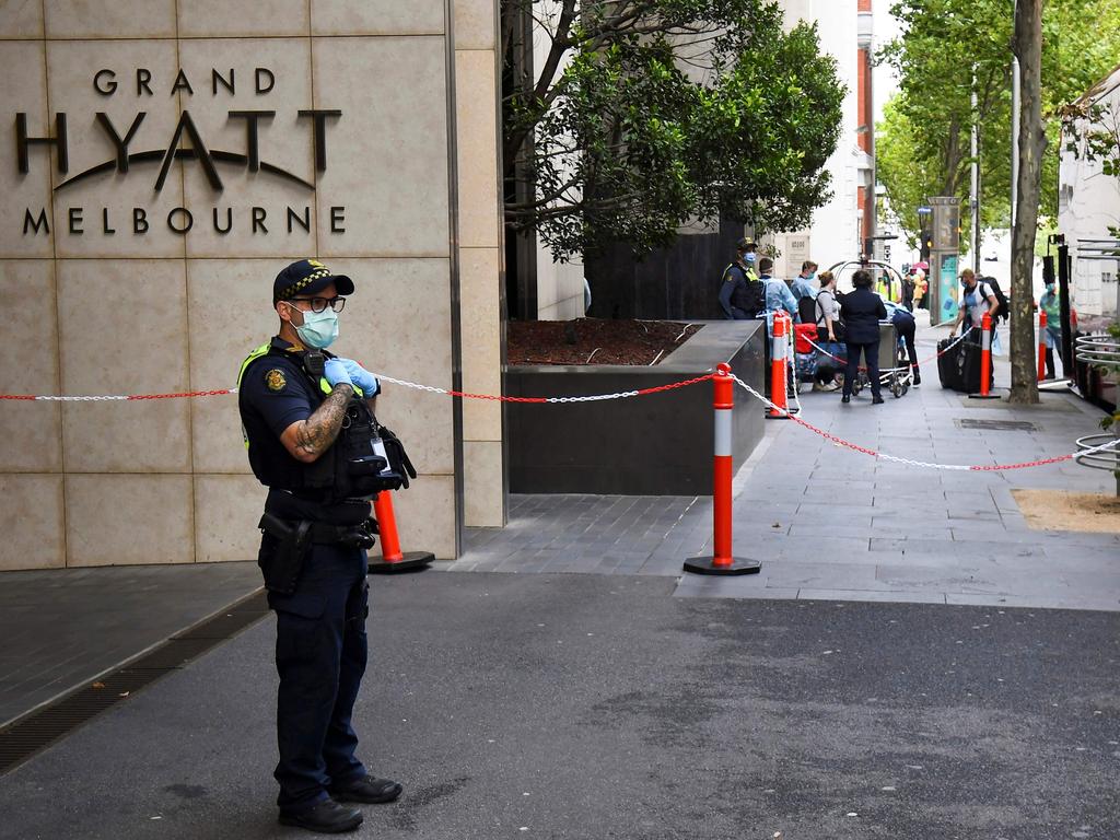 A Victoria Police officer standing guard outside the Grand Hyatt hotel in Melbourne. Picture: William West/AFP