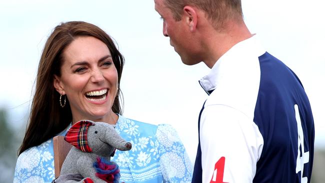 Princess Catherine gives her husband a prize after his win. Picture: Getty Images