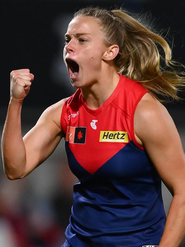 Sarah Lampard celebrates kicking a goal as the home side lifts.