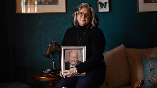 Marita Scott with a photograph of her father Keith English. Picture: Joe Armao/Nine Publishing