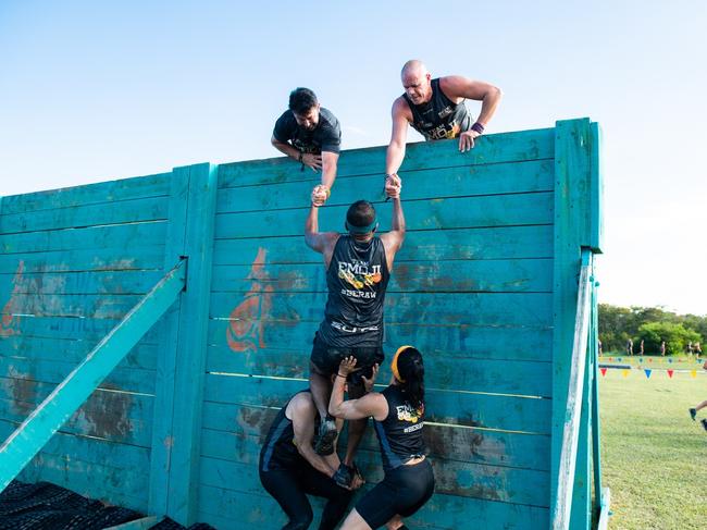 The event hopes to demonstrate no matter how hard the obstacle there’s someone there to give you a hand to get over it. Picture: Andrew Cooney