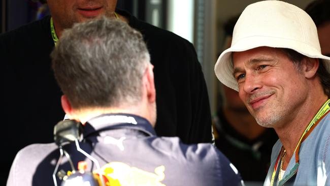 Brad Pitt talks with Red Bull Racing Team Principal Christian Horner.