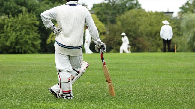 Stock image of a cricket player waiting, leaning on the bat. Picture: iStock