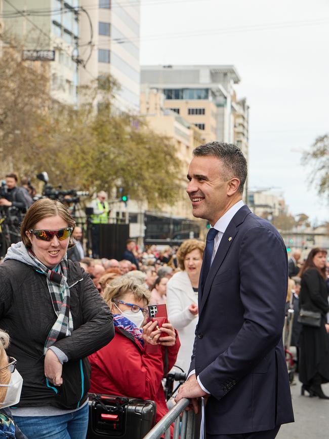 Premier Peter Malinauskas greets people in the crowd. Picture: Matt Loxton