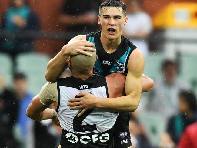 ADELAIDE, AUSTRALIA - MAY 19: Connor Rozee of Port Adelaide celebrates a goal with Sam Powell-Pepper of Port Adelaide during the round nine AFL match between the Port Adelaide Power and the Gold Coast Suns at Adelaide Oval on May 19, 2019 in Adelaide, Australia. (Photo by Mark Brake/Getty Images)