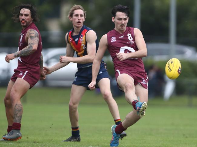 Thomas Thynne kicking for the QAFL representative side in their clash with the Adelaide Football League on Saturday, June 8, at Voxson Oval. Picture credit: AFLQ Media.