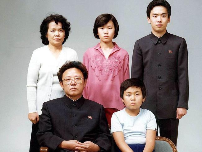 This August 1981 picture shows North Korean leader Kim Jong-il (sitting-L) sitting with his son, Jong-nam (sitting-R), Kim's sister-in-law Sung Hye-rang (L-top), Sung’s daughter Lee Nam-OK (C-top) and son Lee Il-nam (R-top). North Korean leader Kim Jong-il died on December 17, 2011.