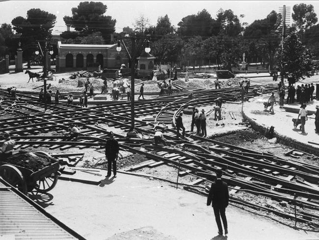 Tram lines are laid on the corner of King William Street and North Tce in 1908.