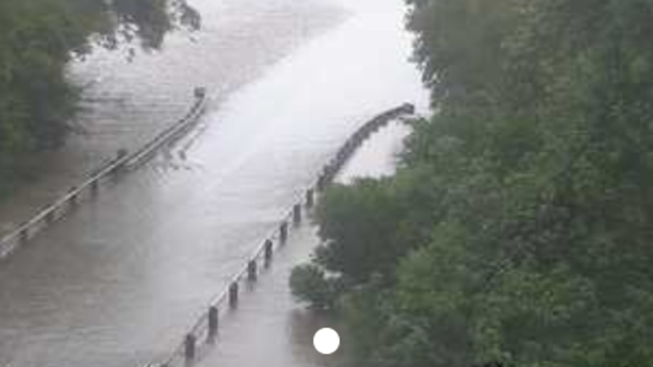 The flooded Seymour River covering the Bruce Highway between Ingham and Cardwell on Wednesday morning. Picture: Supplied