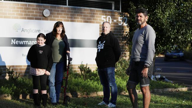 Samantha (9) and Elizabeth Lane, Anthony Bowe and Sam Cauchi are appealing to have their relatives removed from Newmarch House over fears they will contract COVID-19. Picture: Jane Dempster