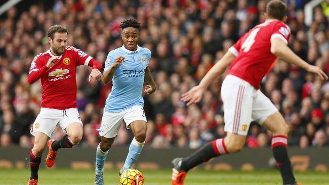 Manchester City's Raheem Sterling and Manchester United's Juan Mata.