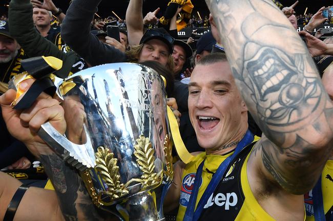 Dustin Martin holds the AFL premiership cup