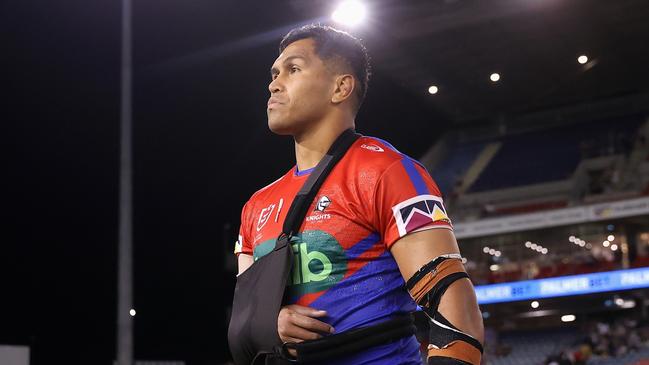 Daniel Saifiti of the Knights is seen with his arm in a brace. Photo by Cameron Spencer/Getty Images.