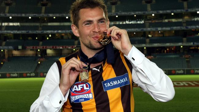 Luke Hodge with his premiership medal and Norm Smith Medal in 2008.