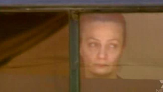 Ms Mikhael at the window of the Lindt cafe during the siege. Picture: Channel 7
